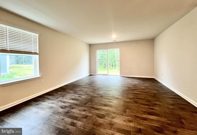 22189 Shorebird Way, Millsboro, DE 19966 - spare room with dark wood-style floors