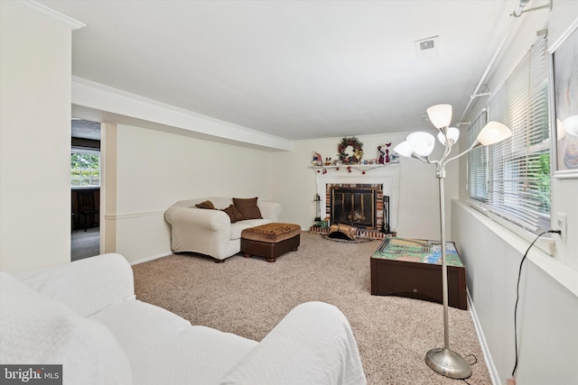 709 Parmentier Rd, Warminster, PA 18974 - living room featuring carpet floors, a brick fireplace, and a chandelier