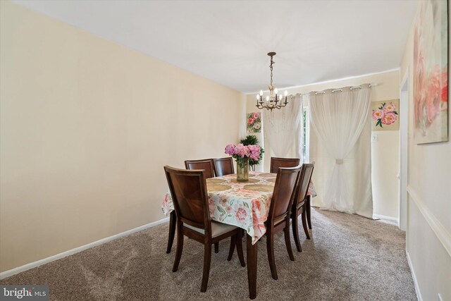709 Parmentier Rd, Warminster, PA 18974 - carpeted dining area with a chandelier and baseboards