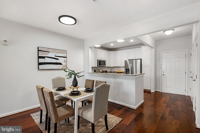 625 Quarry View Ct Unit 208, Reisterstown, MD 21136 - dining area featuring dark wood-type flooring and recessed lighting