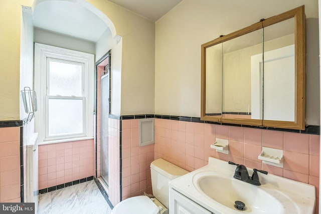 1505 E Barringer St, Philadelphia, PA 19150 - full bath featuring tile walls, a shower stall, wainscoting, and vanity