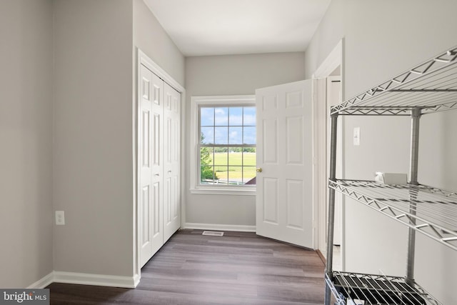 13619 Flintwood Pl, Herndon, VA 20171 - entryway with baseboards and dark wood-type flooring