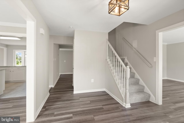 13619 Flintwood Pl, Herndon, VA 20171 - stairway with wood finished floors and a chandelier