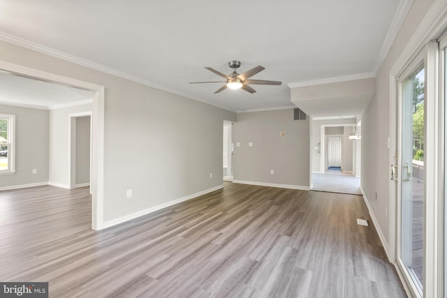 13619 Flintwood Pl, Herndon, VA 20171 - spare room featuring wood finished floors, ceiling fan, and ornamental molding