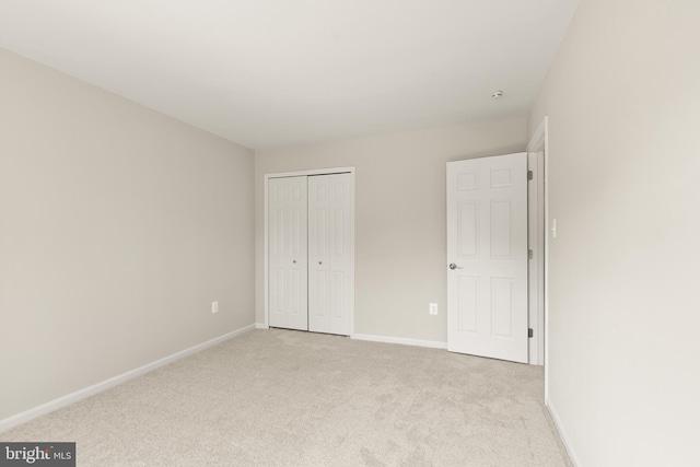 13619 Flintwood Pl, Herndon, VA 20171 - unfurnished bedroom featuring light colored carpet and a closet