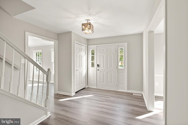 13619 Flintwood Pl, Herndon, VA 20171 - foyer with stairway and wood finished floors