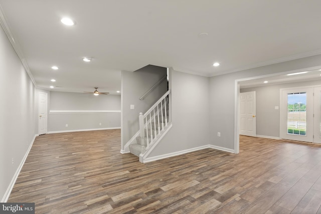13619 Flintwood Pl, Herndon, VA 20171 - spare room with wood finished floors, ornamental molding, stairway, a ceiling fan, and recessed lighting