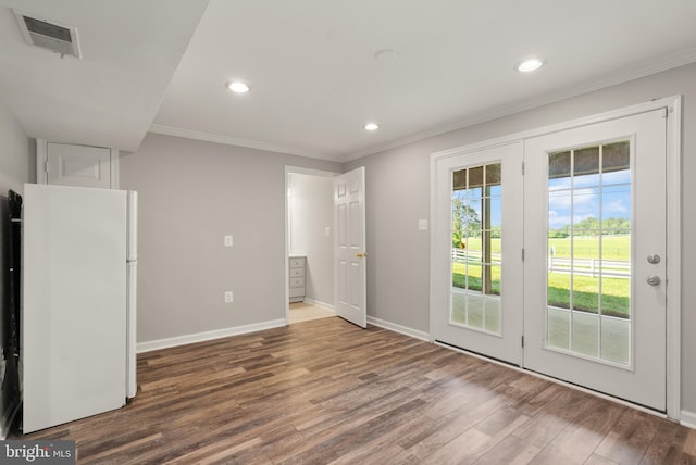 13619 Flintwood Pl, Herndon, VA 20171 - unfurnished bedroom with freestanding refrigerator, access to exterior, crown molding, wood finished floors, and recessed lighting