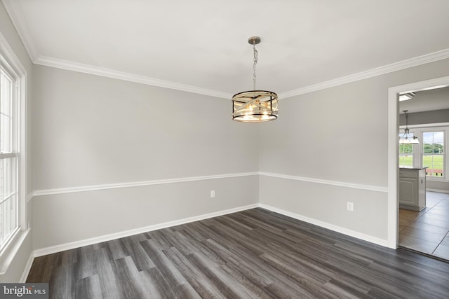 13619 Flintwood Pl, Herndon, VA 20171 - spare room featuring a chandelier, dark wood-style flooring, and ornamental molding