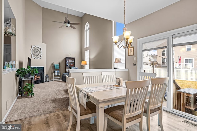 54 Colts Gait Rd, Marlton, NJ 08053 - dining room with wood finished floors, a chandelier, healthy amount of natural light, ceiling fan, and high vaulted ceiling