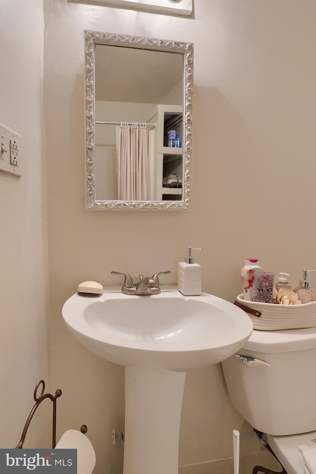 68 Locust St, Lancaster, PA 17602 - bathroom with toilet and a sink