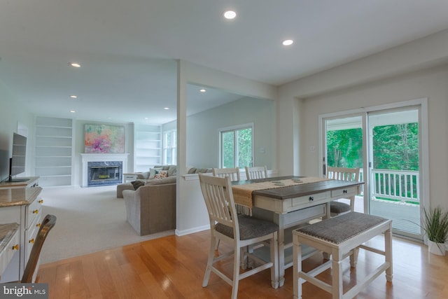12 Dalton Way, Holland, PA 18966 - dining space featuring light wood-type flooring, a premium fireplace, recessed lighting, and built in shelves