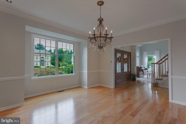 12 Dalton Way, Holland, PA 18966 - spare room featuring a chandelier, stairs, wood finished floors, and french doors