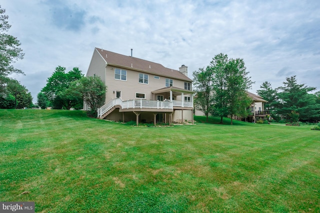 12 Dalton Way, Holland, PA 18966 - back of property with a deck, a yard, a chimney, and stairs
