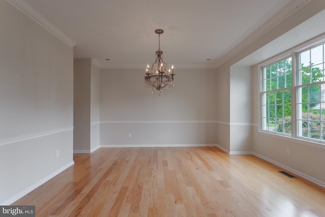 12 Dalton Way, Holland, PA 18966 - spare room featuring a chandelier, light wood-style flooring, and crown molding