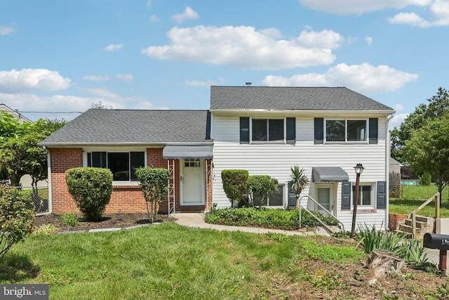 1 Russell Rd, New Castle, DE 19720 - view of front of property with brick siding, a front lawn, and a shingled roof