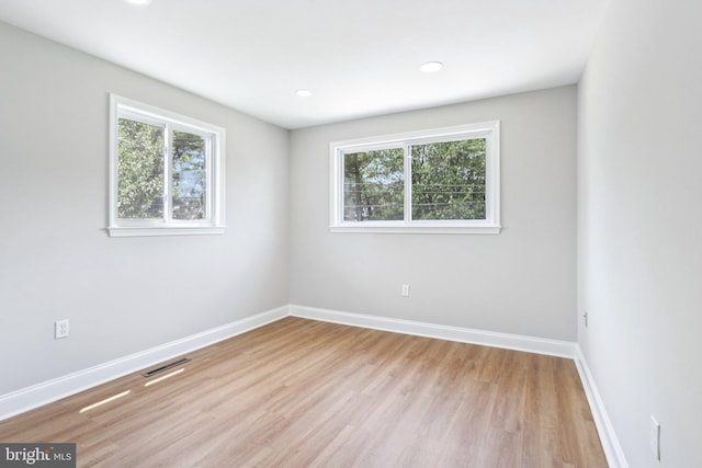 1 Russell Rd, New Castle, DE 19720 - unfurnished room featuring healthy amount of natural light, light wood finished floors, and recessed lighting