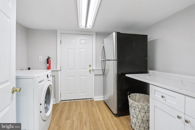 1 Russell Rd, New Castle, DE 19720 - laundry area featuring washer / clothes dryer and light wood-style flooring