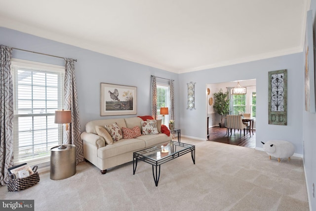 10207 Daylily Ct, Manassas, VA 20110 - carpeted living room featuring healthy amount of natural light and crown molding
