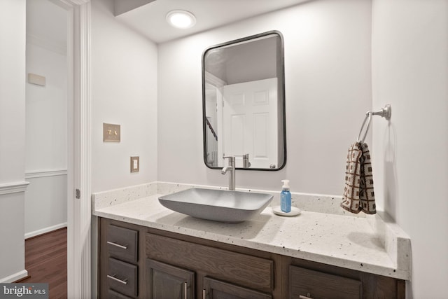10207 Daylily Ct, Manassas, VA 20110 - bathroom featuring vanity and wood finished floors