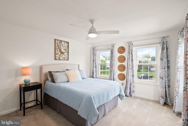 10207 Daylily Ct, Manassas, VA 20110 - bedroom with light colored carpet and ceiling fan