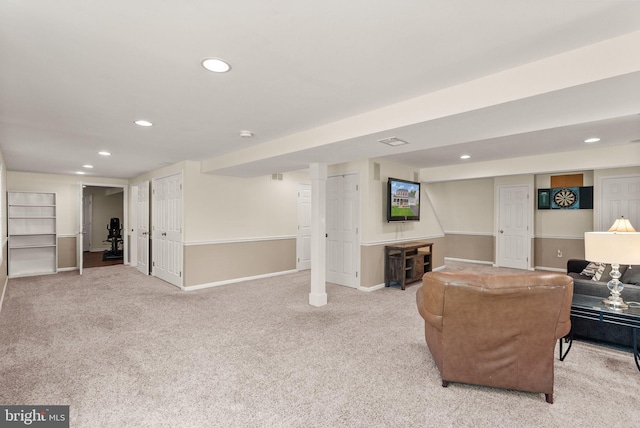 10207 Daylily Ct, Manassas, VA 20110 - carpeted living room with recessed lighting and baseboards