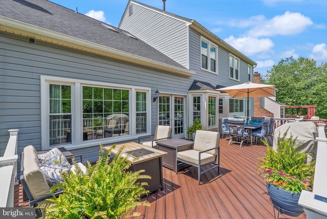 10207 Daylily Ct, Manassas, VA 20110 - wooden deck featuring outdoor dining space