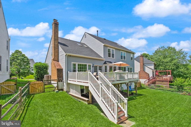 10207 Daylily Ct, Manassas, VA 20110 - rear view of property featuring stairway, a gate, a wooden deck, and a fenced backyard