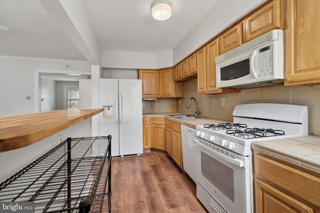 363 E Sharpnack St, Philadelphia, PA 19119 - kitchen with white appliances, tile countertops, wood finished floors, and backsplash