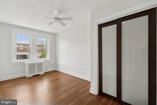 363 E Sharpnack St, Philadelphia, PA 19119 - unfurnished room featuring radiator, dark wood-type flooring, and ceiling fan