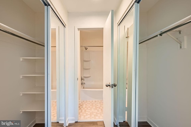 108 W Barre St Unit R 48, Baltimore, MD 21201 - full bathroom featuring shower / washtub combination, wood finished floors, and a closet