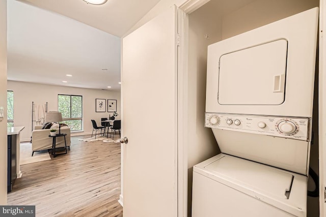 108 W Barre St Unit R 48, Baltimore, MD 21201 - laundry area featuring estacked washer and dryer, light wood-style flooring, and recessed lighting