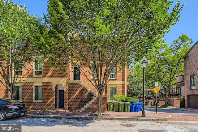 108 W Barre St Unit R 48, Baltimore, MD 21201 - view of front of house with brick siding and stairway