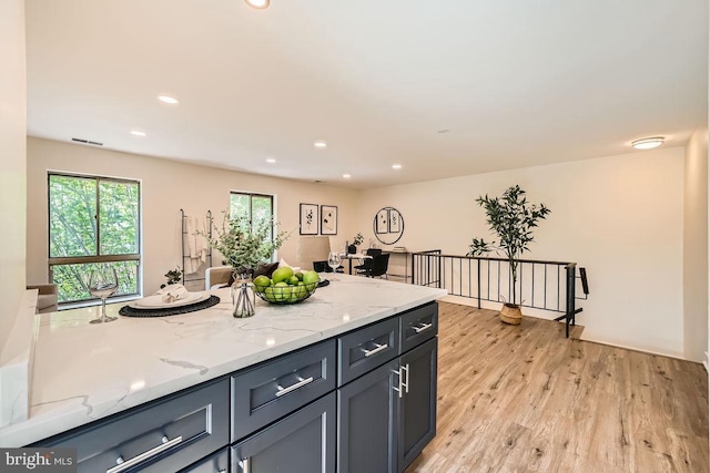 108 W Barre St Unit R 48, Baltimore, MD 21201 - kitchen featuring light wood-style floors, light stone counters, recessed lighting, and gray cabinetry