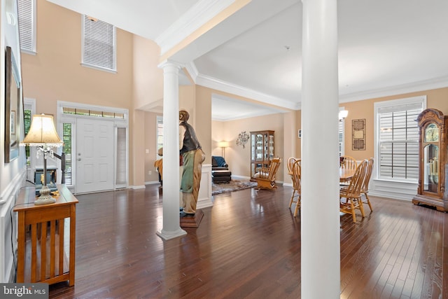 5696 Liberty Manor Cir, Woodbridge, VA 22193 - entrance foyer featuring decorative columns, wood-type flooring, and crown molding
