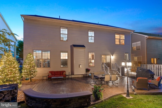 5696 Liberty Manor Cir, Woodbridge, VA 22193 - back of house with an outdoor living space and a patio