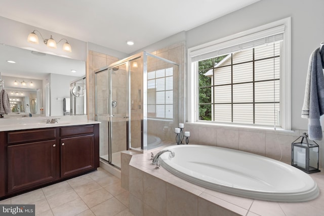 5696 Liberty Manor Cir, Woodbridge, VA 22193 - full bath featuring a bath, vanity, a stall shower, and tile patterned flooring