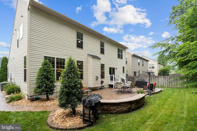 5696 Liberty Manor Cir, Woodbridge, VA 22193 - back of house featuring a patio area
