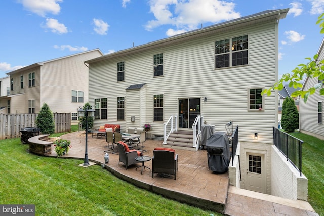 5696 Liberty Manor Cir, Woodbridge, VA 22193 - rear view of house featuring a patio area and an outdoor hangout area