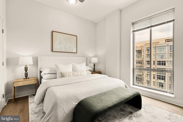 301 Massachusetts Ave NW Unit 1103, Washington, DC 20001 - bedroom featuring wood finished floors and baseboards
