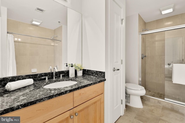 301 Massachusetts Ave NW Unit 1103, Washington, DC 20001 - full bathroom featuring a shower stall, vanity, and tile patterned floors