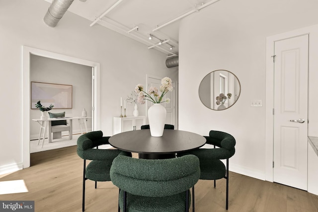 301 Massachusetts Ave NW Unit 1103, Washington, DC 20001 - dining area featuring light wood-style floors and track lighting