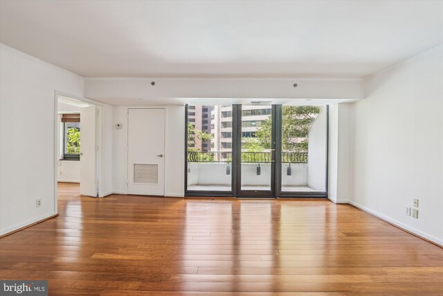 1200 Crystal Dr Unit 514, Arlington, VA 22202 - unfurnished room with hardwood / wood-style floors