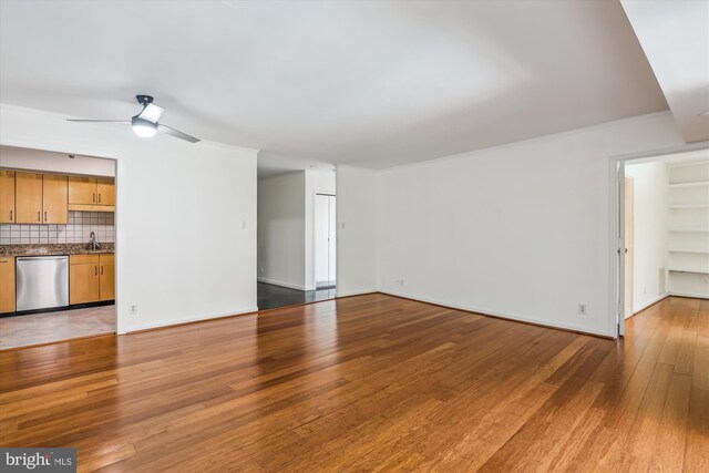 1200 Crystal Dr Unit 514, Arlington, VA 22202 - unfurnished living room with light wood-style flooring and ceiling fan