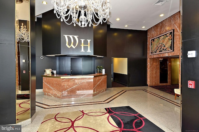 1200 Crystal Dr Unit 514, Arlington, VA 22202 - reception featuring a chandelier and recessed lighting