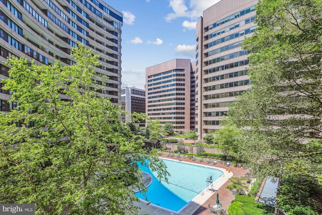1200 Crystal Dr Unit 514, Arlington, VA 22202 - community pool featuring a view of city