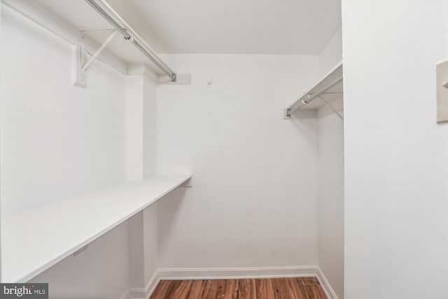 1200 Crystal Dr Unit 514, Arlington, VA 22202 - walk in closet with wood finished floors