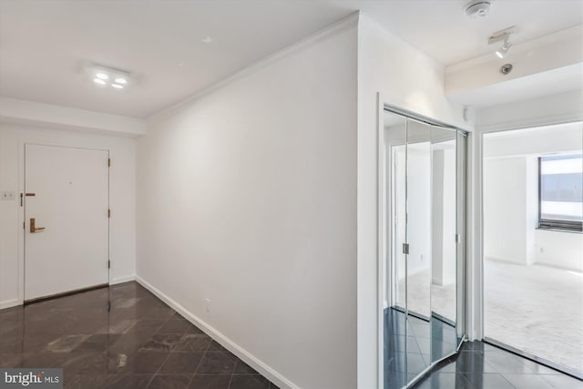 1200 Crystal Dr Unit 514, Arlington, VA 22202 - hallway with dark colored carpet and crown molding
