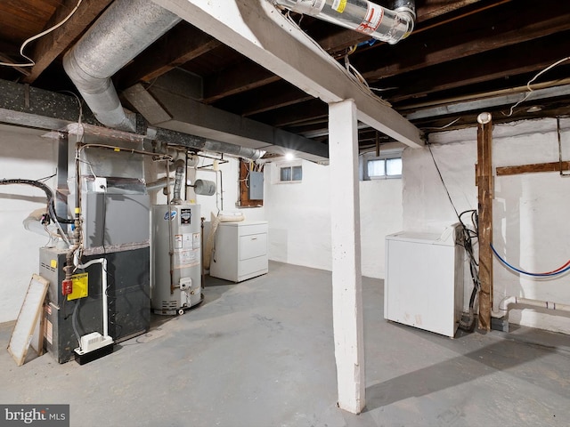 2603 N Tatnall St, Wilmington, DE 19802 - below grade area featuring water heater, electric panel, washer and dryer, and heating unit