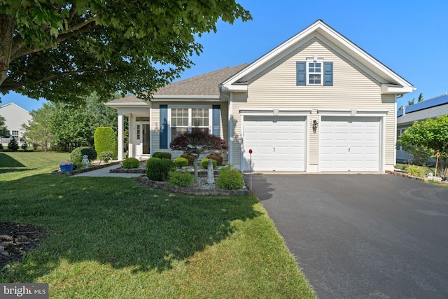 8 Spout Ter, Barnegat, NJ 08005 - view of front of home with asphalt driveway and a front lawn